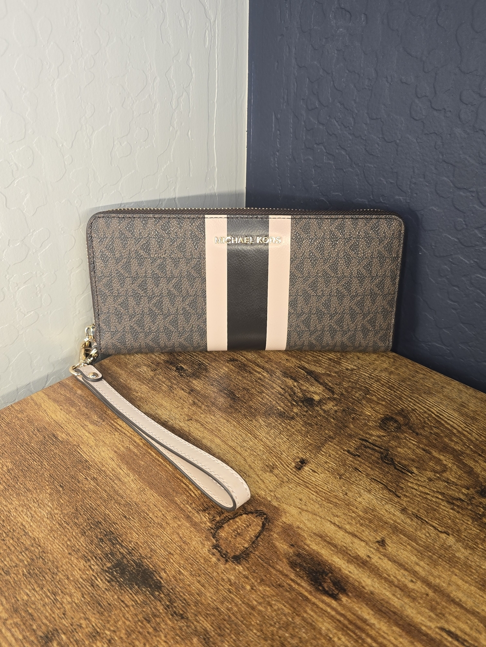 Michael Kors Brown Logo Zip Wristlet with Pink and Black Stripe